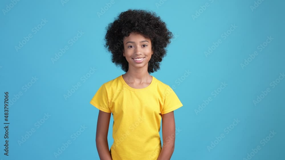 Child girl impressed gift grateful isolated blue color background Child girl impressed gift grateful isolated blue color background