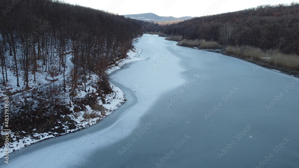 aerial view of the surface of a frozen lake aerial view of the surface of a frozen lake