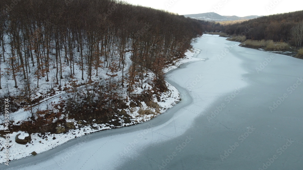 aerial view of the surface of a frozen lake aerial view of the surface of a frozen lake