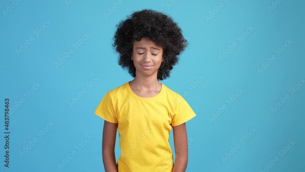 Child girl accuse mind wrong decision isolated blue color background Child girl accuse mind wrong decision isolated blue color background