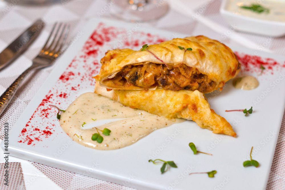 Dishes of Eastern cuisine: meat and mushrooms in soy dough. Dishes of Eastern cuisine: meat and mushrooms in soy dough.
