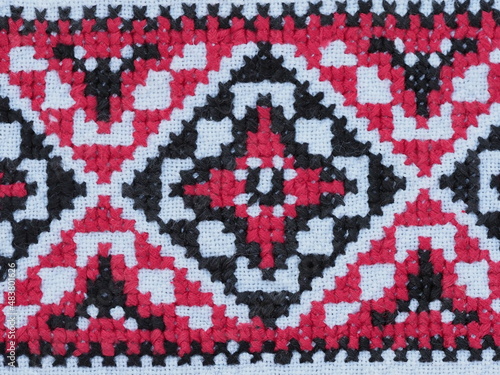 national patterns on the fabric of the moldovan costume photo