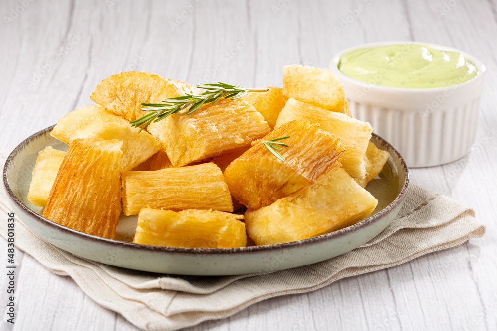 Fried cassava. Cassava, traditional Brazilian food. Fried cassava. Cassava, traditional Brazilian food.