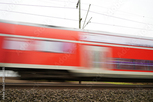 German Regional Train passing by - in-motion unsharpness photo