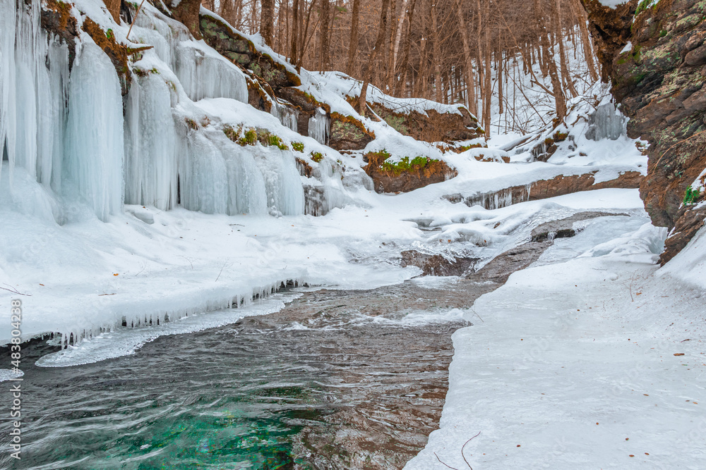 Fototapeta premium frozen stream in winter