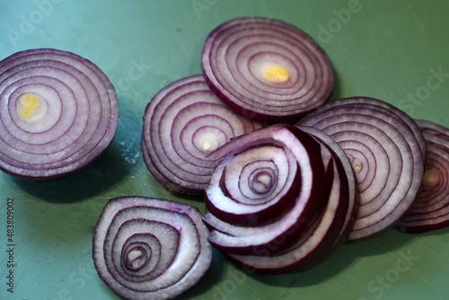 Fresh sliced red onions, plant based food, cooking ingredients 