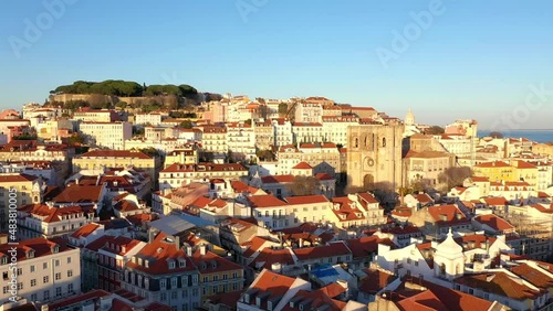 Aerial view of Cathedral of Lisbon (Sé de Lisboa). Sao Jorge Castle in the background. Winter Sunset (ID: 483810005)