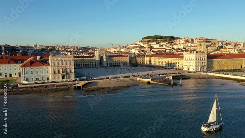 Aerial drone view of the Augusta Street Arch from Commerce Square in Lisbon, Portugal. Winter sunset. (ID: 483810223)
