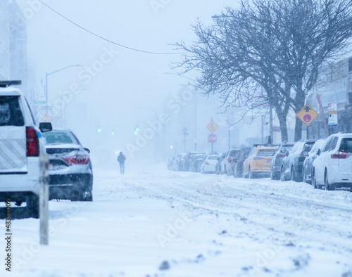 City bad weather, snow storm in city streets, cars covered by snow, heavy snow fall. © Stock fresh 