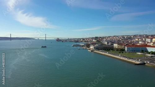 Aerial drone view of the Augusta Street Arch from Commerce Square in Lisbon, Portugal. Sunny day with blue sky. (ID: 483811033)