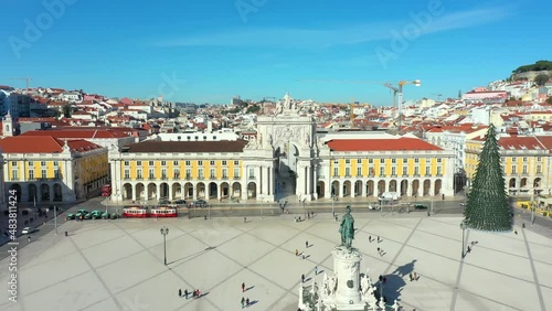 Aerial drone view of the Augusta Street Arch from Commerce Square in Lisbon, Portugal. Sunny day with blue sky. Joseph I portuguese king statue. (ID: 483811424)