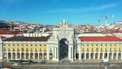 Aerial drone view of the Augusta Street Arch from Commerce Square in Lisbon, Portugal. Sunny day with blue sky. (ID: 483811645)