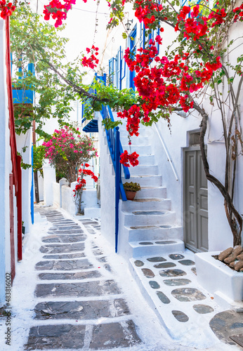 Charming typical floral streets of greek islands. Mykonos, Cyclades. popular summer tourist destination