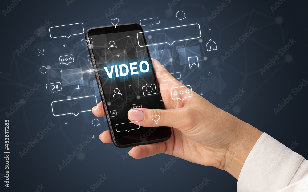 Hand using smartphone with social media concept Hand using smartphone with social media concept