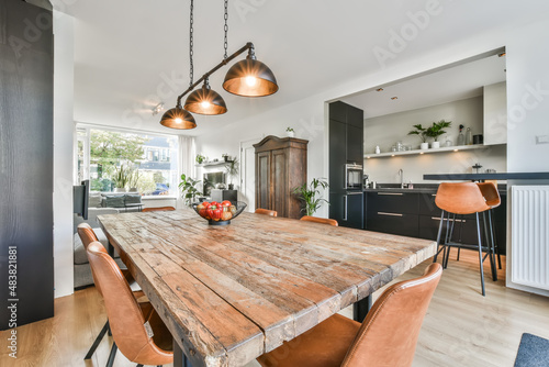 Dining room interior in modern urban appartment photo