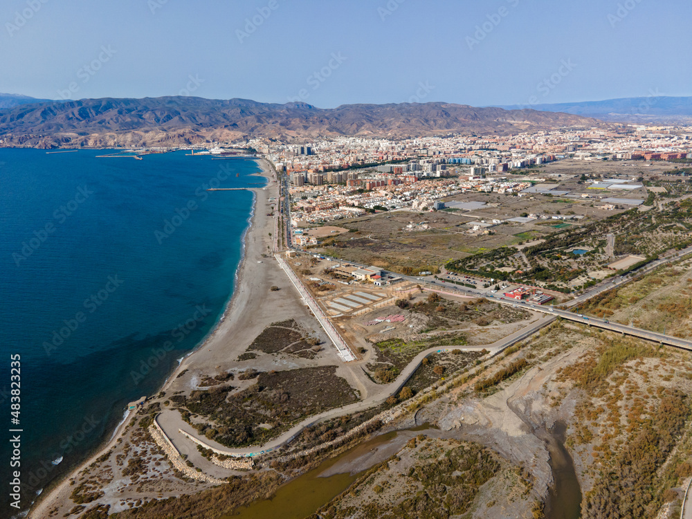 Aerial panorama of the city of Almeria, Spain, and the mountains of Sierra Nevada in the distance
