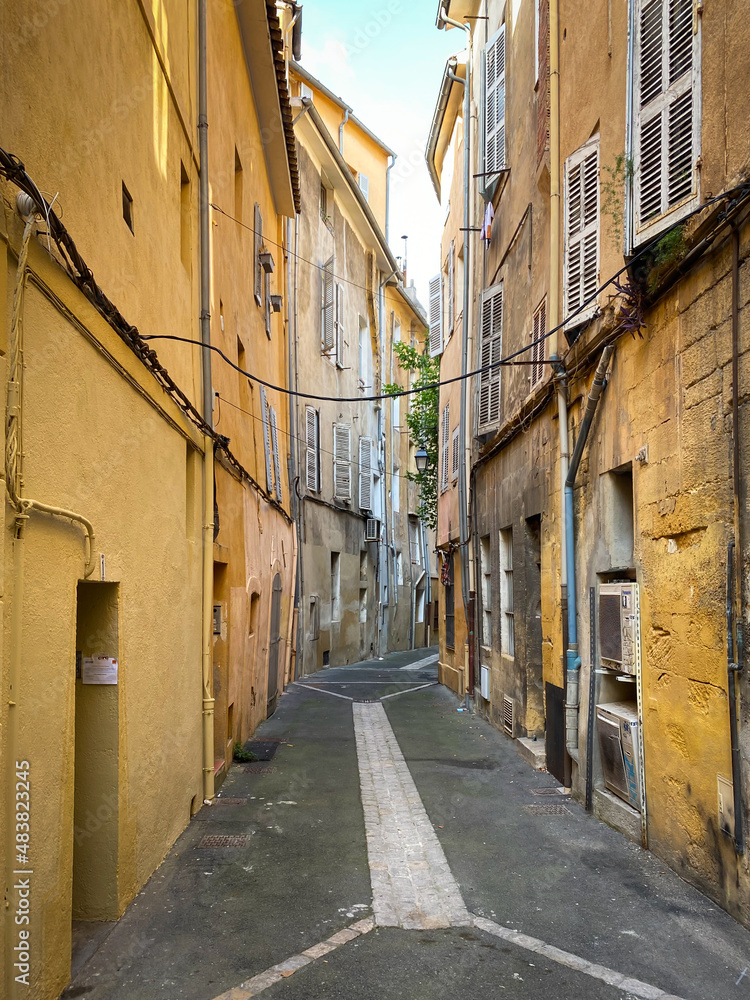 Typical colorful old city street and buildings of Aix en Provence, France