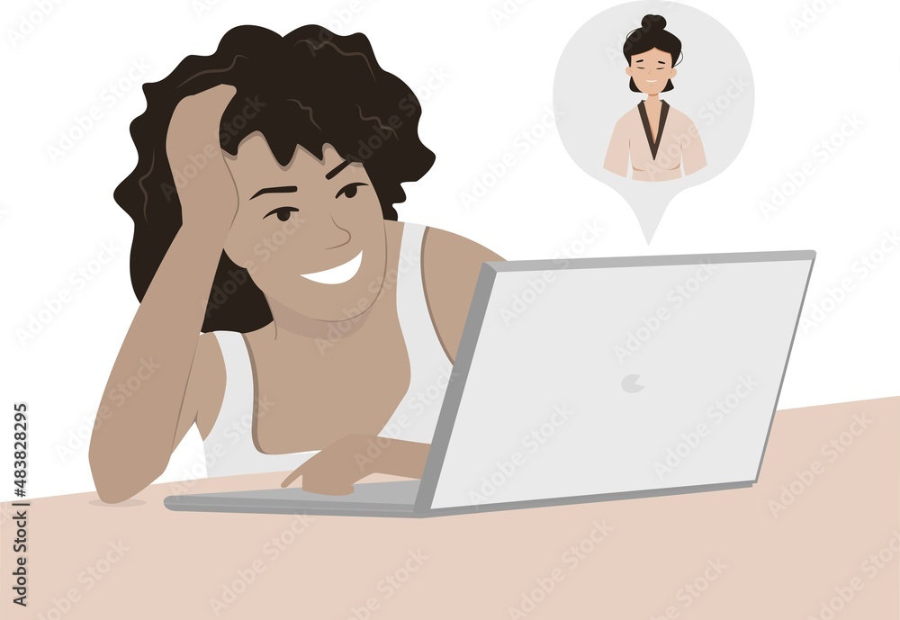 Girls of different nationalities at home or in the office at a desk with a laptop. Communication via online video, urgent meeting, remote work, freelance. Girls of different nationalities at home or in the office at a desk with a laptop. Communication via online video, urgent meeting, remote work, freelance.