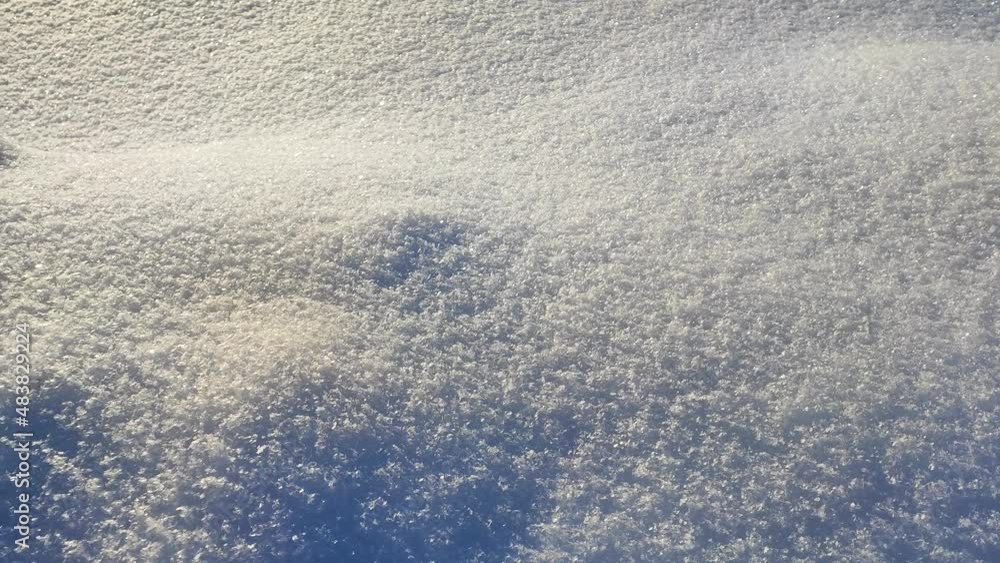 Winter snow. Snow sparkles in the sun. Texture of ice crystals. Winter snow. Snow sparkles in the sun. Texture of ice crystals.