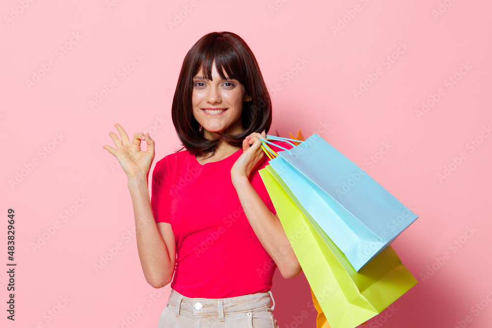 young woman smile colorful packets happiness Lifestyle fashion young woman smile colorful packets happiness Lifestyle fashion