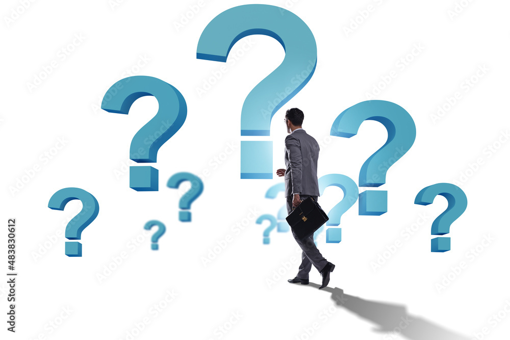Concept of uncertainty with question and businessman Concept of uncertainty with question and businessman