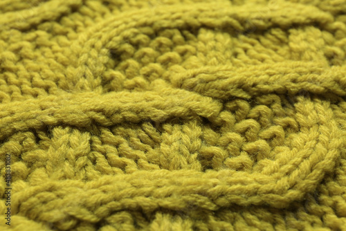 Knitted fabric with beautiful pattern as background, closeup