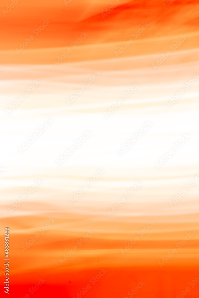 Abstract orange red background with a white-hot center. Vertical banner. Provides space for text.