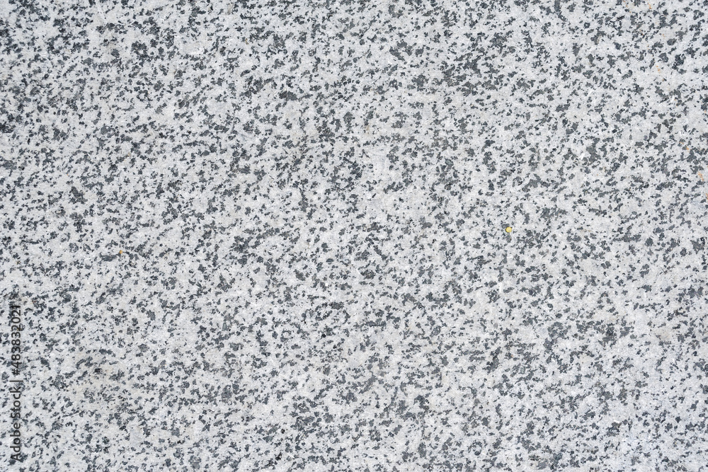 Close-up, texture, background of gray granite wall.
