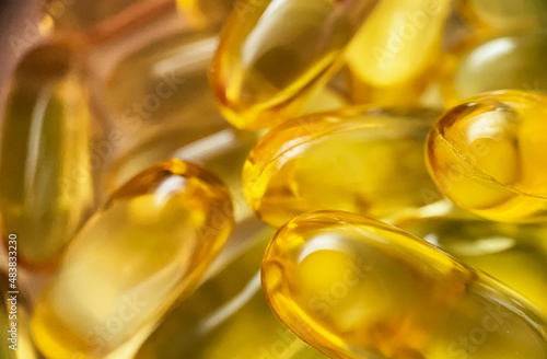 Close-up texture of many omega 3 capsules. Polyunsaturated fatty acids. The concept of a healthy lifestyle