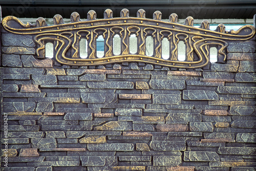 concrete fence with imitation texture of masonry old wall