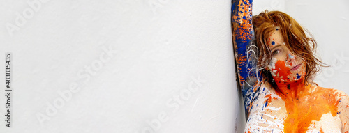 Obraz na plátně panorama abstract art portrait of a seductive young sexy redhead woman, dots of