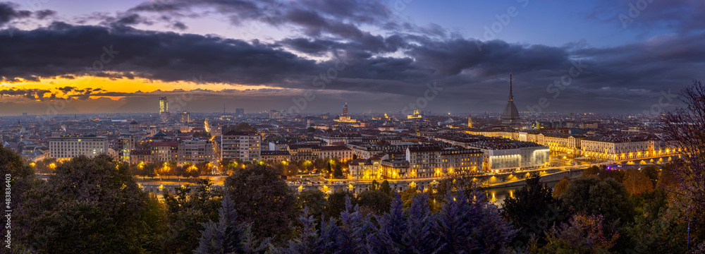 Beautiful breathtaking evening panoramic cityscape of the majestic famous ancient italian city of Turin