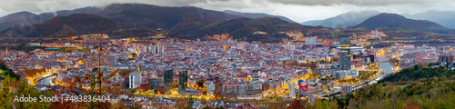 Stunning evening aerial view of autumn Bilbao at rainy weather from Artxanda hill, Basque country, Spain. photo
