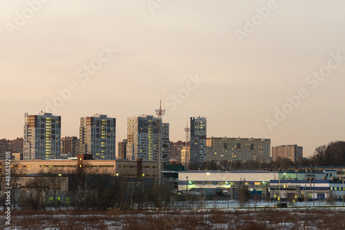 Production workshops on the background of the city. Moskovsky district Kommunarka