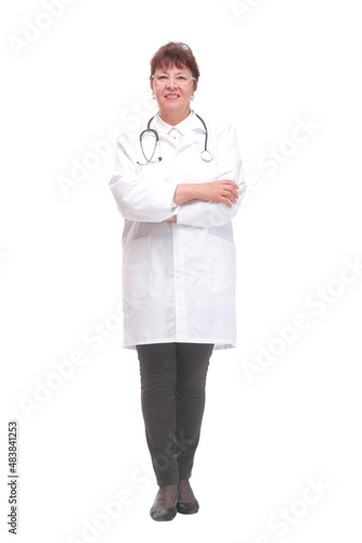 Front view of smiling doctor woman with arms crossed