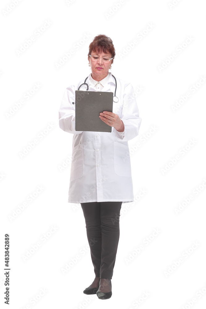 Front view of female doctor with stethoscope writing on clipboard Front view of female doctor with stethoscope writing on clipboard