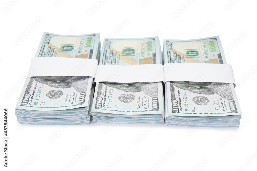 Bundles of dollar banknotes on white background. American national currency Bundles of dollar banknotes on white background. American national currency