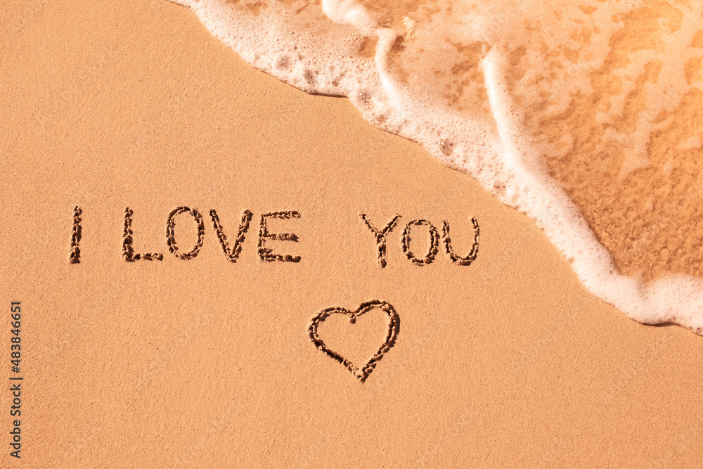 Fototapeta premium I love you inscription on the sand beach