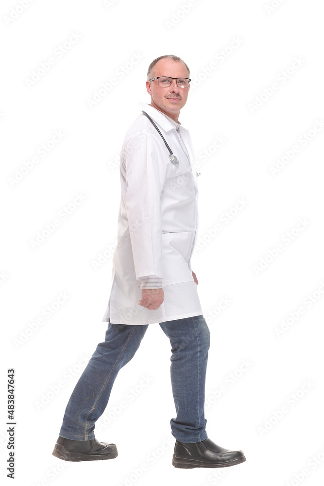Middle age doctor with stethoscope walking on white background Middle age doctor with stethoscope walking on white background