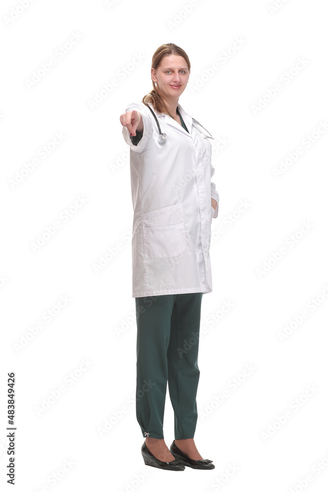 Happy smiling female doctor pointing at the camera against white background Happy smiling female doctor pointing at the camera against white background