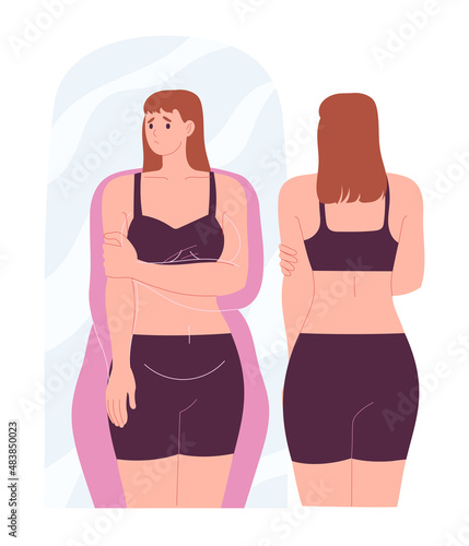 Woman is unhappy with her reflection in the mirror, overweight, it seems to her that she is fatter than she really is photo