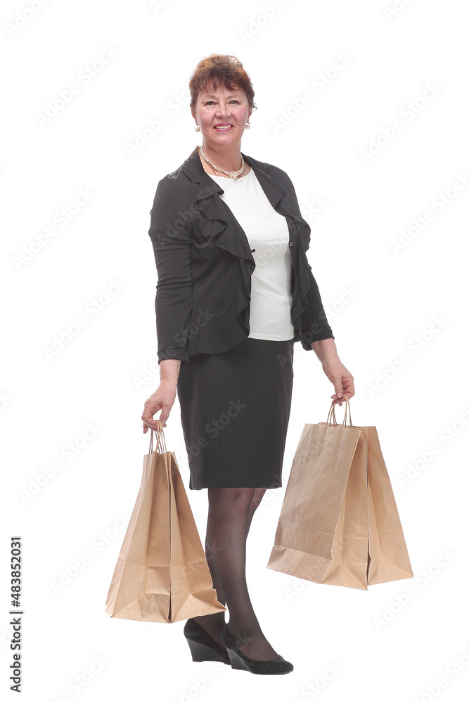 Full isolated portrait of a senior woman with shopping bags happy smiling Full isolated portrait of a senior woman with shopping bags happy smiling