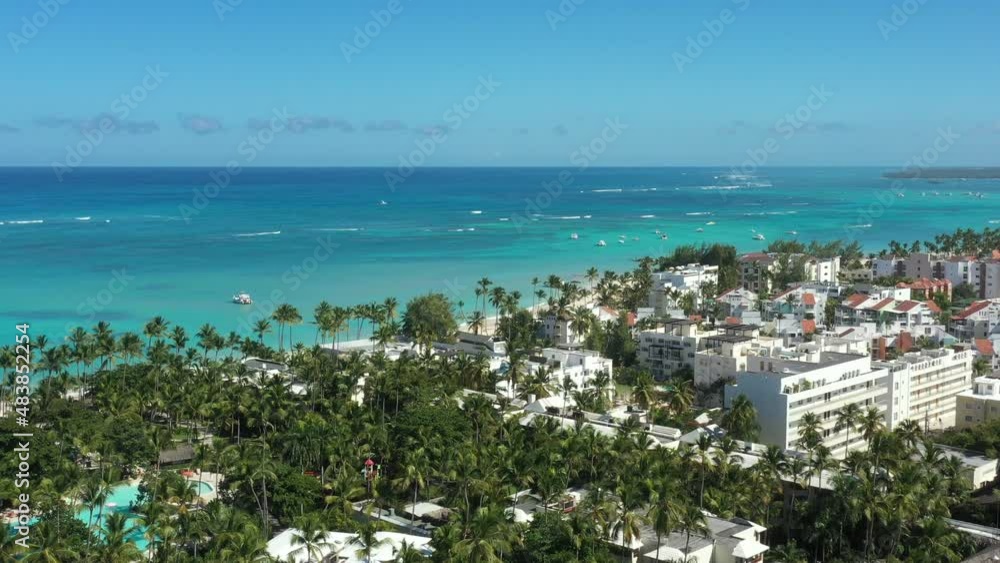 Tropical seashore with resorts, palm trees and caribbean sea. Travel destinations. Dominican Republic. Aerial view Tropical seashore with resorts, palm trees and caribbean sea. Travel destinations. Dominican Republic. Aerial view
