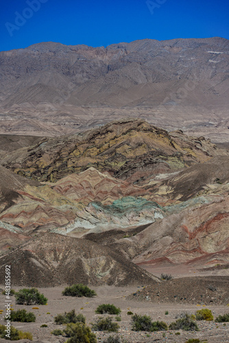 Multi-colored geology amidst the barren altiplano landscape on the way from Fiambalá to the Paso San Francisco mountain pass, Catamarca province, Argentina photo