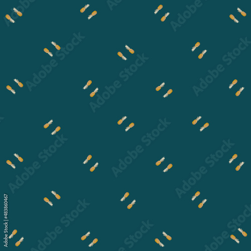 Colorful fruit pattern of pineapples on green background. Top view. Flat lay. Pop art design
