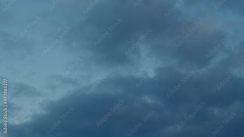 Beautiful time-lapse of altocumulus clouds moving from day to night Beautiful time-lapse of altocumulus clouds moving from day to night