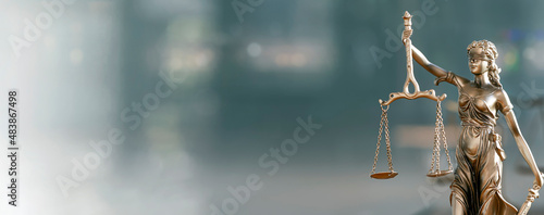 Obraz Legal and law concept. Statue of Lady Justice with scales of justice and wooden judge gavel on wooden table. Panoramic image statue of lady justice.
