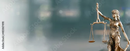 Obraz Legal and law concept. Statue of Lady Justice with scales of justice and wooden judge gavel on wooden table. Panoramic image statue of lady justice.