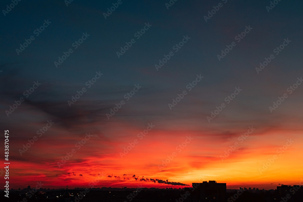 orange sunset over big city orange sunset over big city