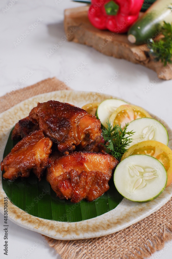 a plate of chicken roasted with vegetables a plate of chicken roasted with vegetables